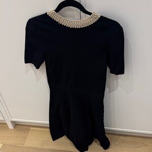 Elegant Black Dress with Pearl Collar